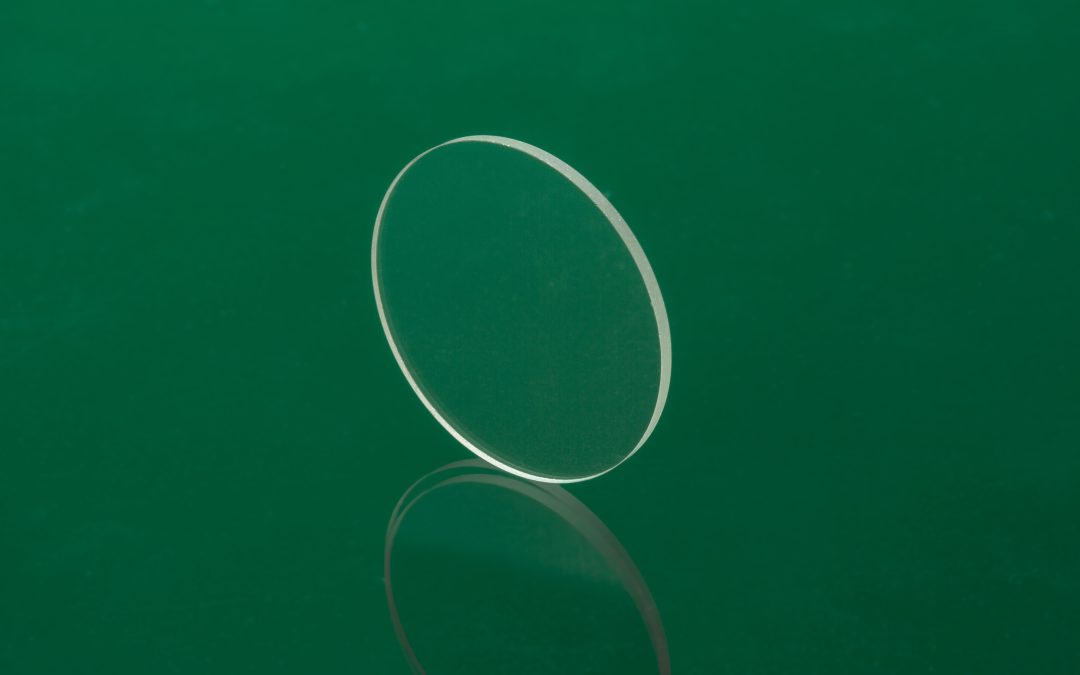 Image of a glass disk for an article about what pitch polishing is.