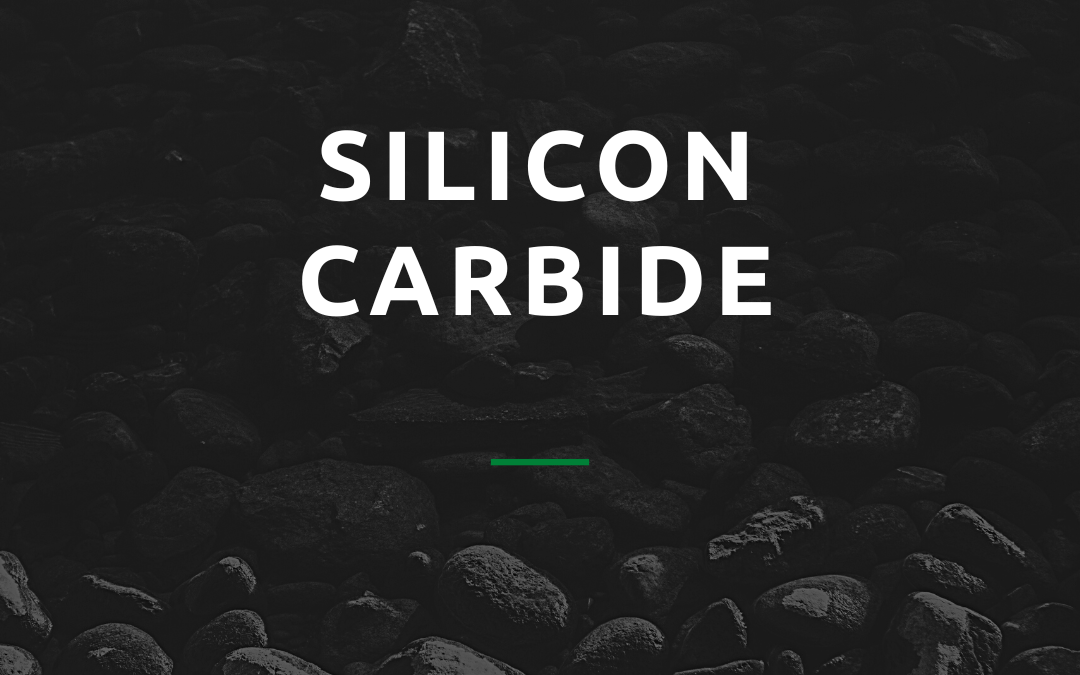 Image of black rocks with white text overlay saying Silicon Carbide for an Overview of Silicon Carbide. about