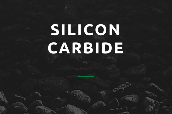 Image of black rocks with white text overlay saying Silicon Carbide for an Overview of Silicon Carbide. about